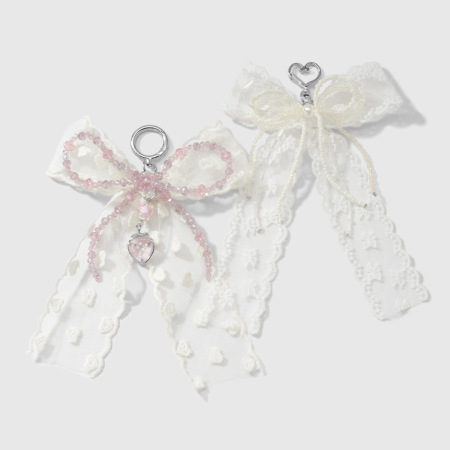 Breloques de sac en dentelle avec nœud papillon