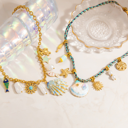 Colliers pendentifs en acier inoxydable couleur or, étanches, de la série Vacances, en forme de coquillage