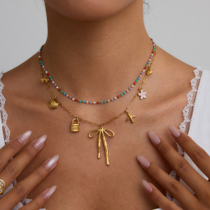 Collier Pendentif Nœud Papillon En Acier Inoxydable Étanche Couleur Or h5 Image4