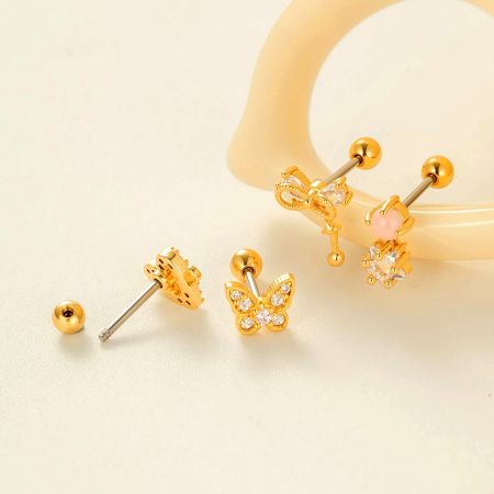 Boucles d'oreilles piercing en forme de nœud papillon en cuivre doré et zircon 2