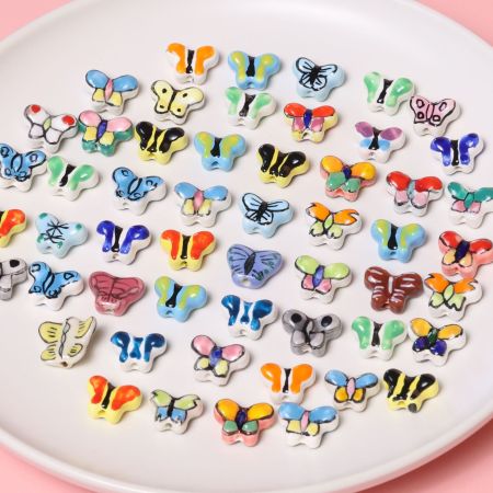 1 pièce de perle papillon en céramique pour bijoux à faire soi-même
