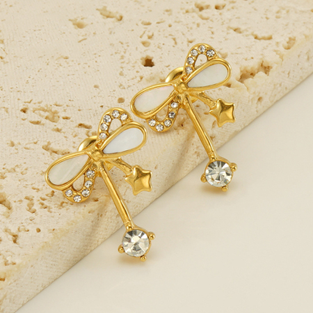 Boucles d'oreilles à clous en acier inoxydable imperméable couleur or avec nœud papillon