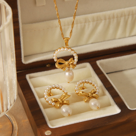 Boucles d'oreilles pendantes pour femmes, élégantes, en acier inoxydable, avec nœud papillon, étanches, de la série Luxueuse 2