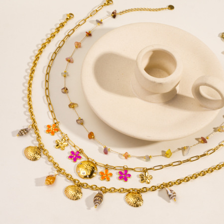 Colliers élégants avec pendentif en forme de fleur en acier inoxydable couleur or pour femme