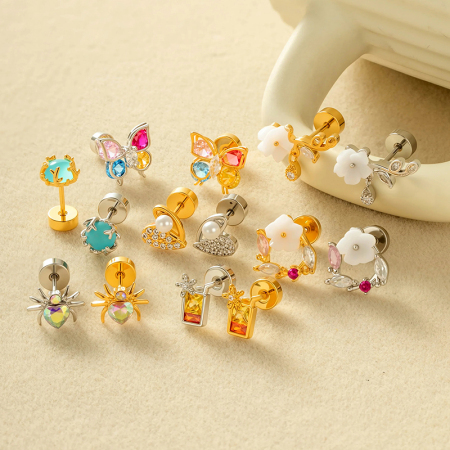 Boucles d'oreilles papillon en cuivre doré et zircon