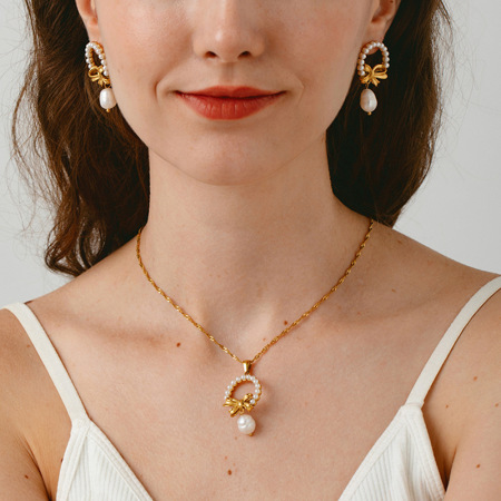 Boucles d'oreilles pendantes pour femmes, élégantes, en acier inoxydable, avec nœud papillon, étanches, de la série Luxueuse