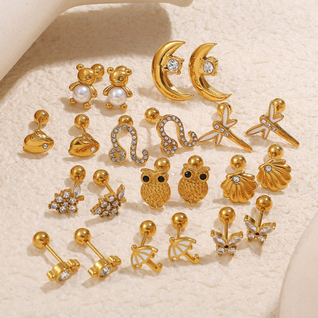 1 paire de boucles d'oreilles puces en acier inoxydable doré, imperméables, motif animal.