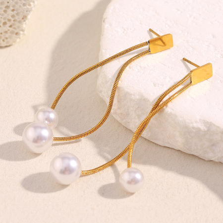 1 paire de boucles d'oreilles pendantes élégantes à pompons en acier inoxydable étanche couleur or 2