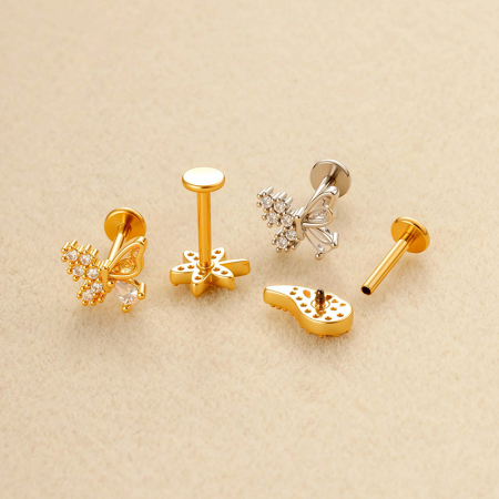 Boucle d'oreille piercing papillon en cuivre doré et zircon 2