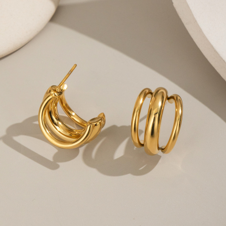 1 paire de boucles d'oreilles puces simples et élégantes pour femme, en acier inoxydable imperméable, de forme irrégulière.