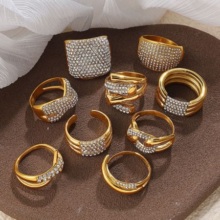 Bague en acier inoxydable de forme irrégulière, étanche, couleur or, ornée d'un strass.