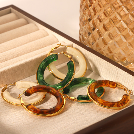 1 paire de boucles d'oreilles créoles géométriques simples pour femme, en acier inoxydable étanches, à porter au quotidien.