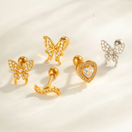 Boucle d'oreille piercing papillon en cuivre doré et zircon