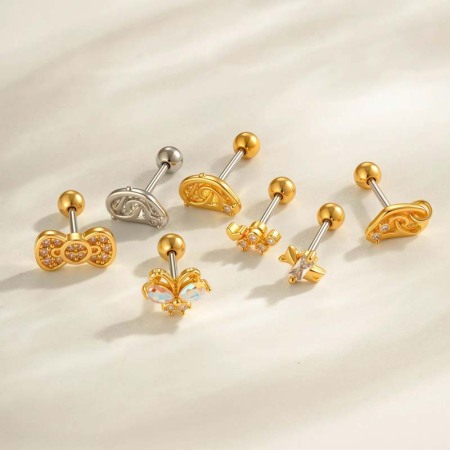 Boucle d'oreille piercing en forme de nœud en cuivre doré et zircon