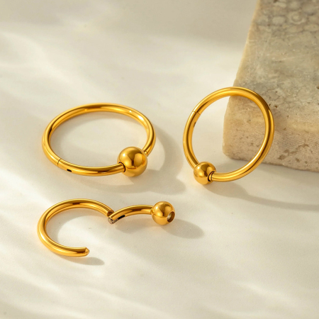Boucle d'oreille piercing ronde simple en acier inoxydable étanche couleur or (1 pièce)