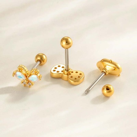 Boucle d'oreille piercing en forme de nœud en cuivre doré et zircon 2