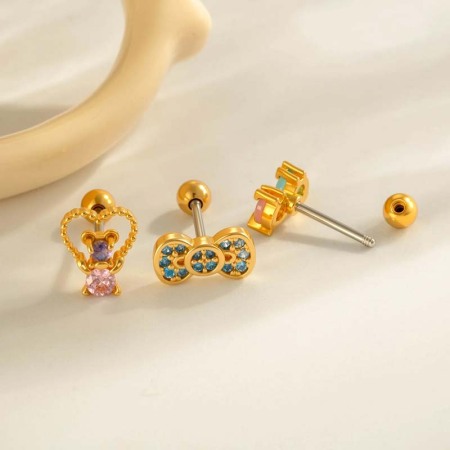 Boucle d'oreille piercing en forme de nœud en cuivre doré et zircon 2