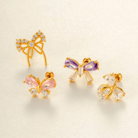 Boucle d'oreille piercing en forme de nœud papillon en cuivre doré et zircon