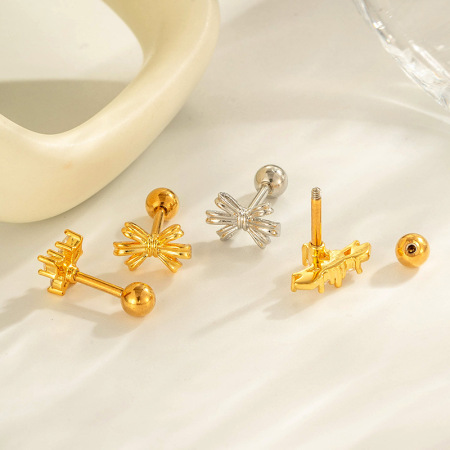 Boucle d'oreille piercing en forme de nœud papillon en cuivre doré et zircon 2