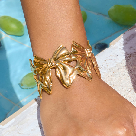 Bracelet manchette sophistiqué pour femme, en acier inoxydable, étanche, couleur or, avec nœud papillon (1 pièce).