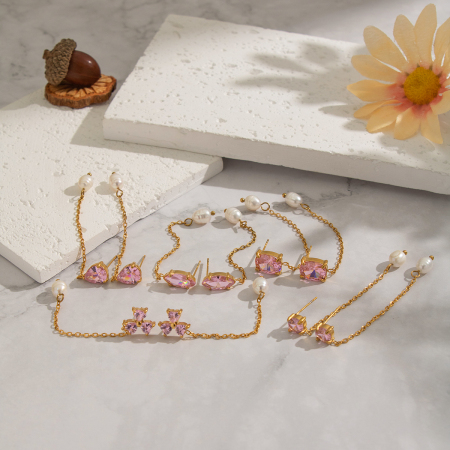 1 paire de boucles d'oreilles pendantes en acier inoxydable de forme irrégulière, étanches, couleur or, serties de zircon.