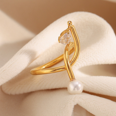 Bague pour femme en acier inoxydable torsadé, étanche, couleur or, sertie d'un zircon. 2