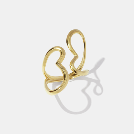 Bague minimaliste en acier inoxydable doré, couleur or, avec un cœur aux lignes simples.