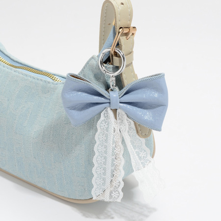 1 pièce de breloque de sac en cuir avec nœud papillon 2