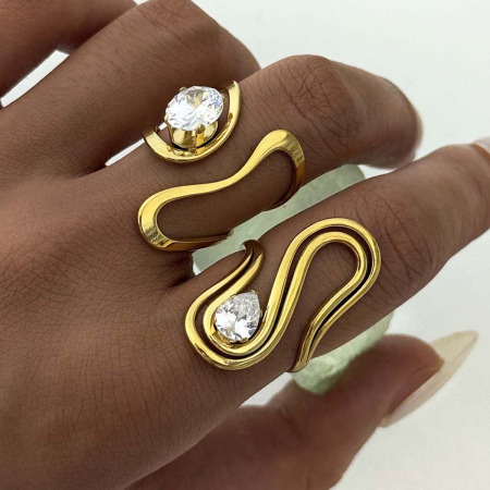 Bague tendance en acier inoxydable doré, forme irrégulière, étanche, ornée d'un zircon.