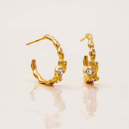 1 paire de boucles d'oreilles créoles luxueuses pour femme, en acier inoxydable imperméable, de forme irrégulière et de couleur dorée.