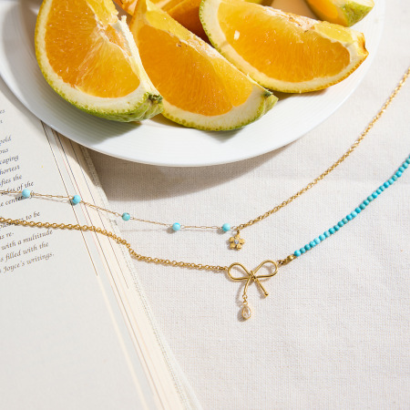 Collier à plusieurs rangs pour femme, orné d'un nœud papillon élégant, en acier inoxydable imperméable et couleur or (1 pièce) 2