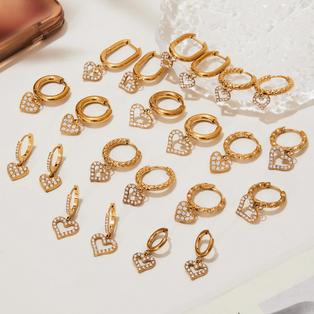 1 paire de boucles d'oreilles pendantes pour femme, en acier inoxydable doré, ornées de zircon et serties d'un cœur exquis. 2