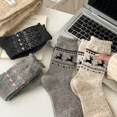 1 paire de chaussettes mi-mollet en laine épaisse à motif de Noël et d'élan pour femme
