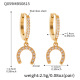 Boucles d'oreilles en forme de fer à cheval doré, serties de diamants et de zircons Image4