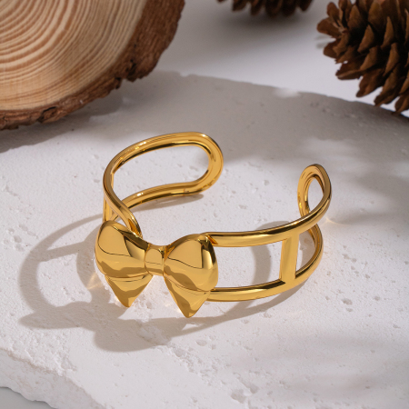 Bracelet manchette en acier inoxydable doré, étanche, avec nœud papillon (1 pièce).