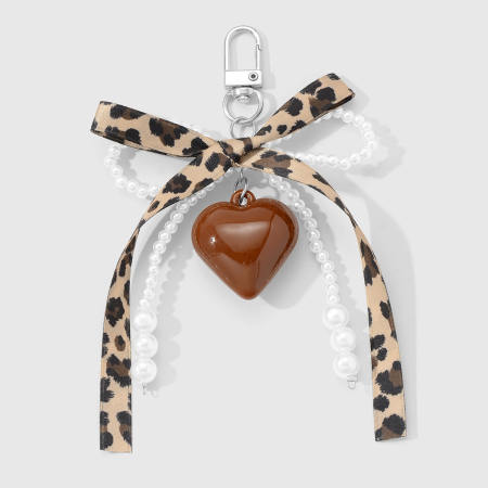 1 pièce de breloque de sac en acrylique avec nœud papillon et imprimé léopard en forme de cœur