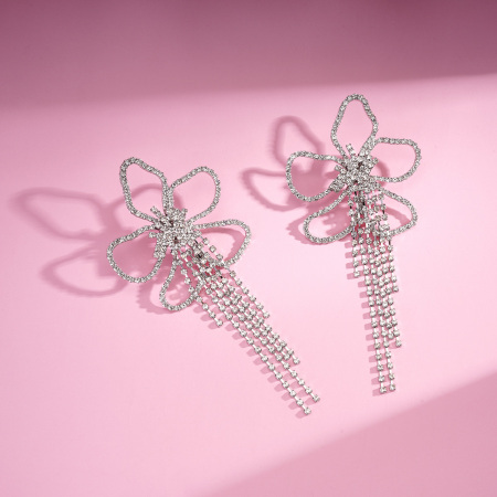 1 paire de boucles d'oreilles festives à pompons et fleurs en cuivre