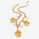 Collier de perles à fleurs dorées