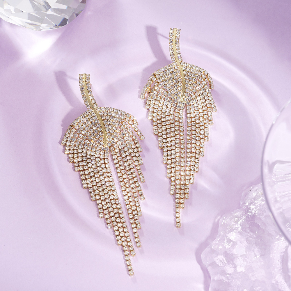 Boucles D'Oreilles Festives En Cuivre Avec Pompons Et Feuilles (1 Paire)