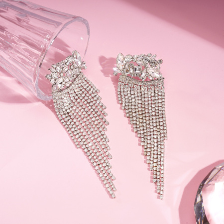 1 paire de boucles d'oreilles festives à pompons en cuivre 2