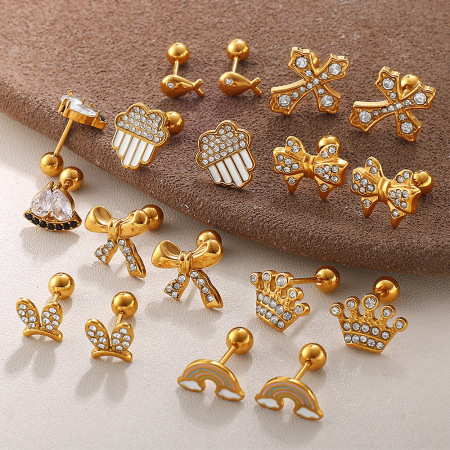 1 paire de boucles d'oreilles piercing en acier inoxydable doré, étanches, avec nœud papillon et strass.
