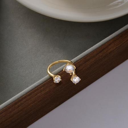 Bague pour femme en acier inoxydable doré, étanche, de forme irrégulière et ornée d'un zircon, ornée d'une pierre précieuse. 2