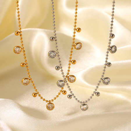 Collier pendentif femme luxueux en acier inoxydable doré, orné d'un zircon, avec un pendentif rond en forme de cercle.