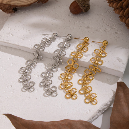 1 paire de boucles d'oreilles pendantes romantiques en acier inoxydable doré, imperméables, à motif floral.