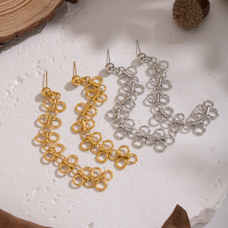 1 paire de boucles d'oreilles pendantes romantiques en acier inoxydable doré, imperméables, à motif floral. 2