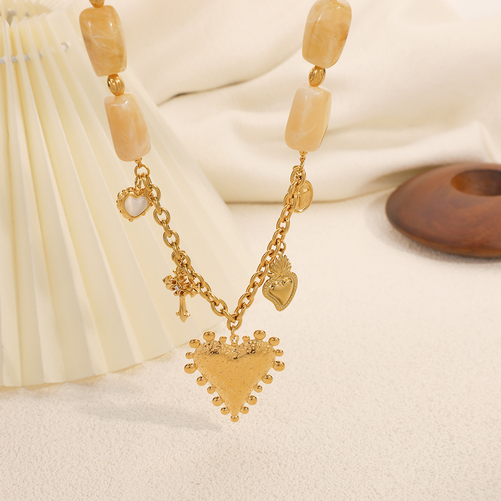 Collier Pendentif Femme Luxueux En Acier Inoxydable Étanche, Représentant Un Cœur Et Une Croix. Image3