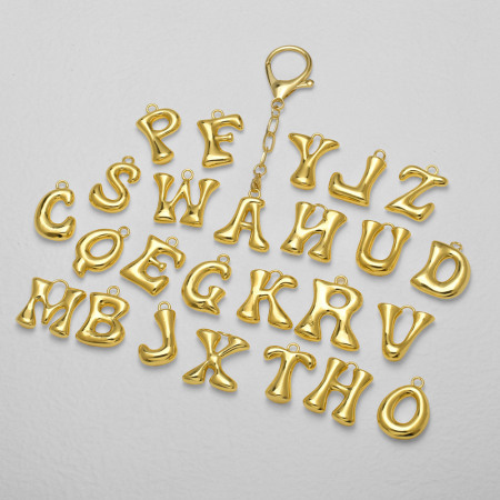 1 porte-clés lettre bulle couleur cuivre doré