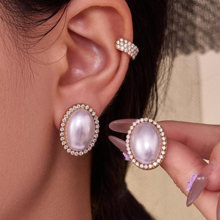 1 paire de magnifiques boucles d'oreilles ovales en acier inoxydable étanche couleur or avec zircon pour femme