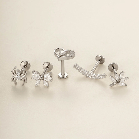 Boucles d'oreilles piercing pour femme, en acier inoxydable doré, ornées d'un nœud papillon et d'un serpent, avec zircon et motif cœur délicat. 2