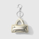 1 petit pendentif boucle en argent couleur or 